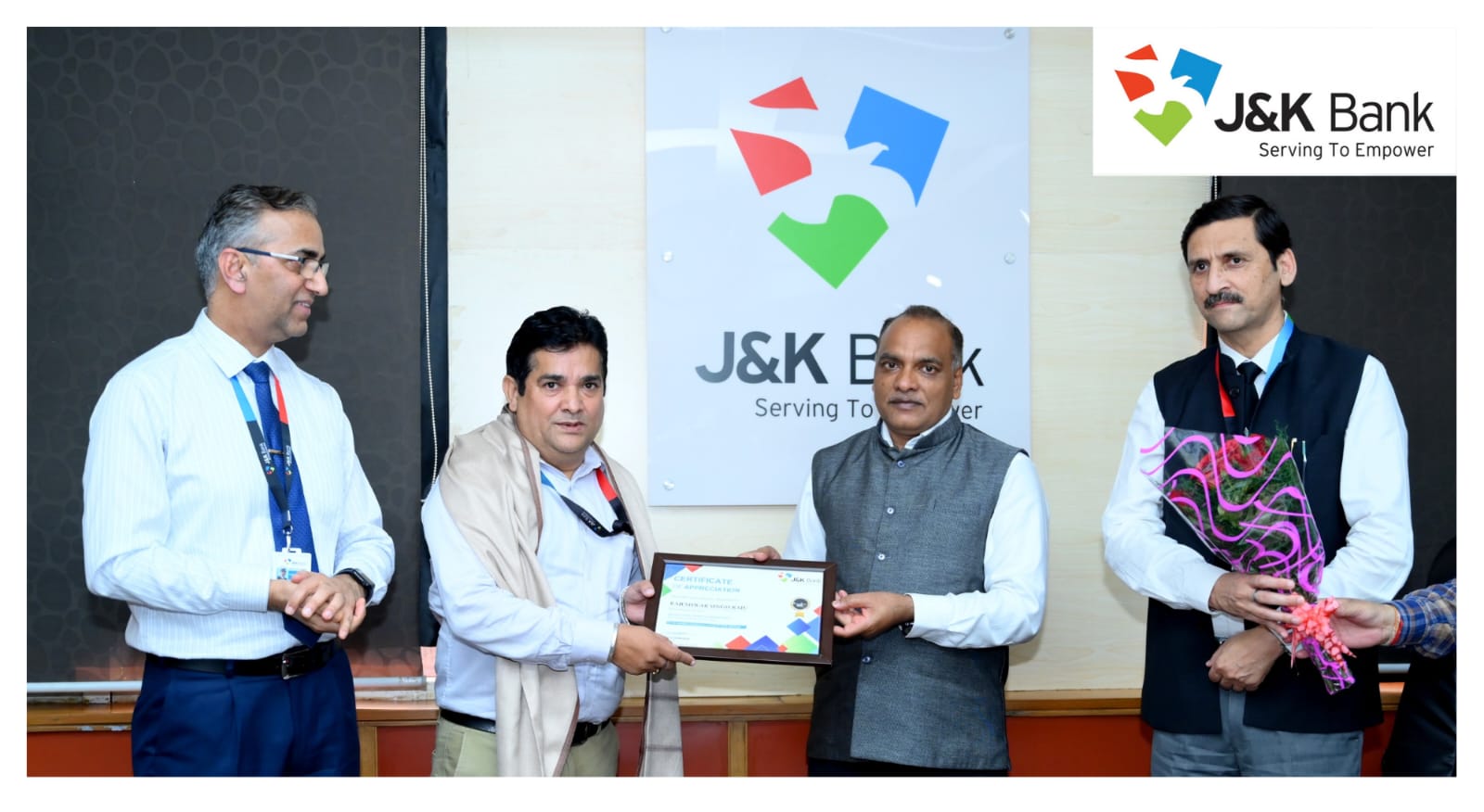 J&K Bank MD felicitates staff member J&K Bank MD felicitates staff member